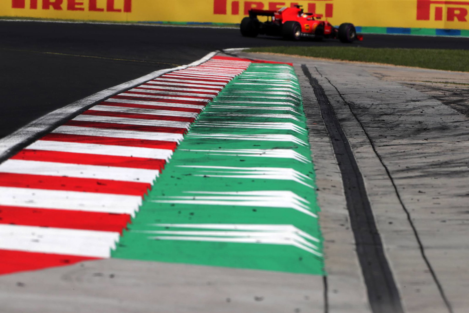 Vettel outpaces Red Bull pair to put Ferrari top in tight Hungary FP2