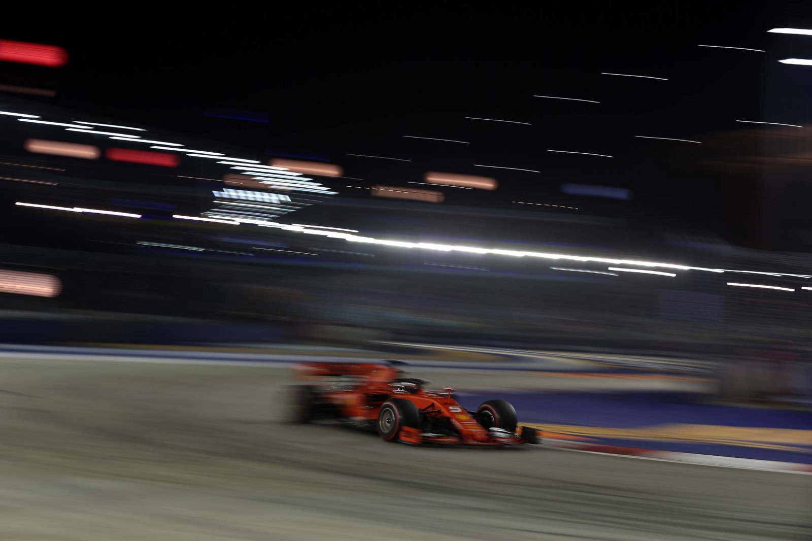 Vettel takes Singapore victory as Ferrari strategy frustrates Leclerc