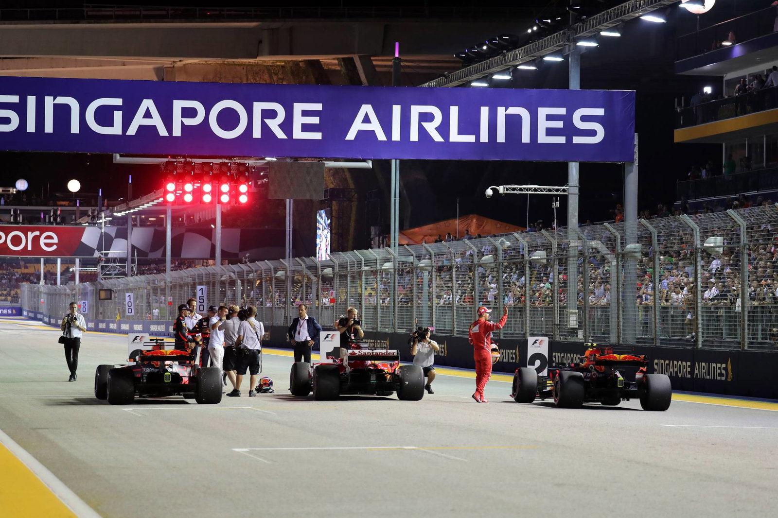 Vettel, Raikkonen crash out of Singapore GP in chaotic wet start