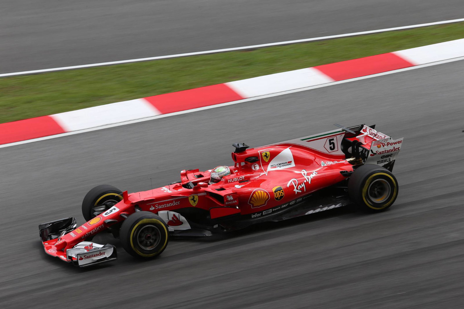 Vettel leads shortened Malaysia FP2 after Grosjean crash