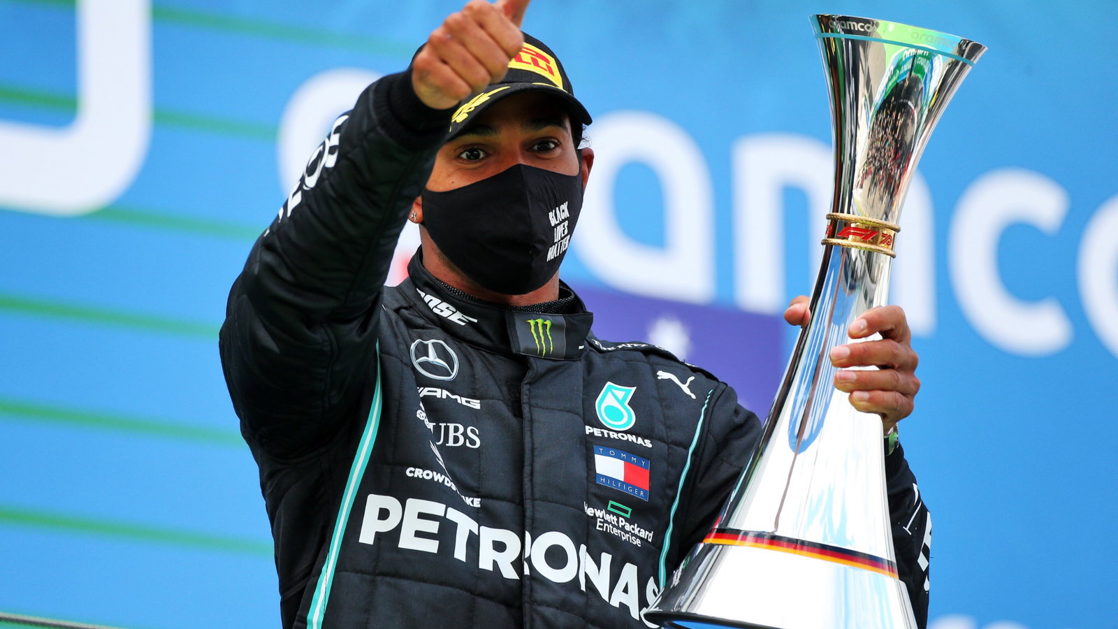 Race winner Lewis Hamilton (GBR) Mercedes AMG F1 celebrates on the podium.
