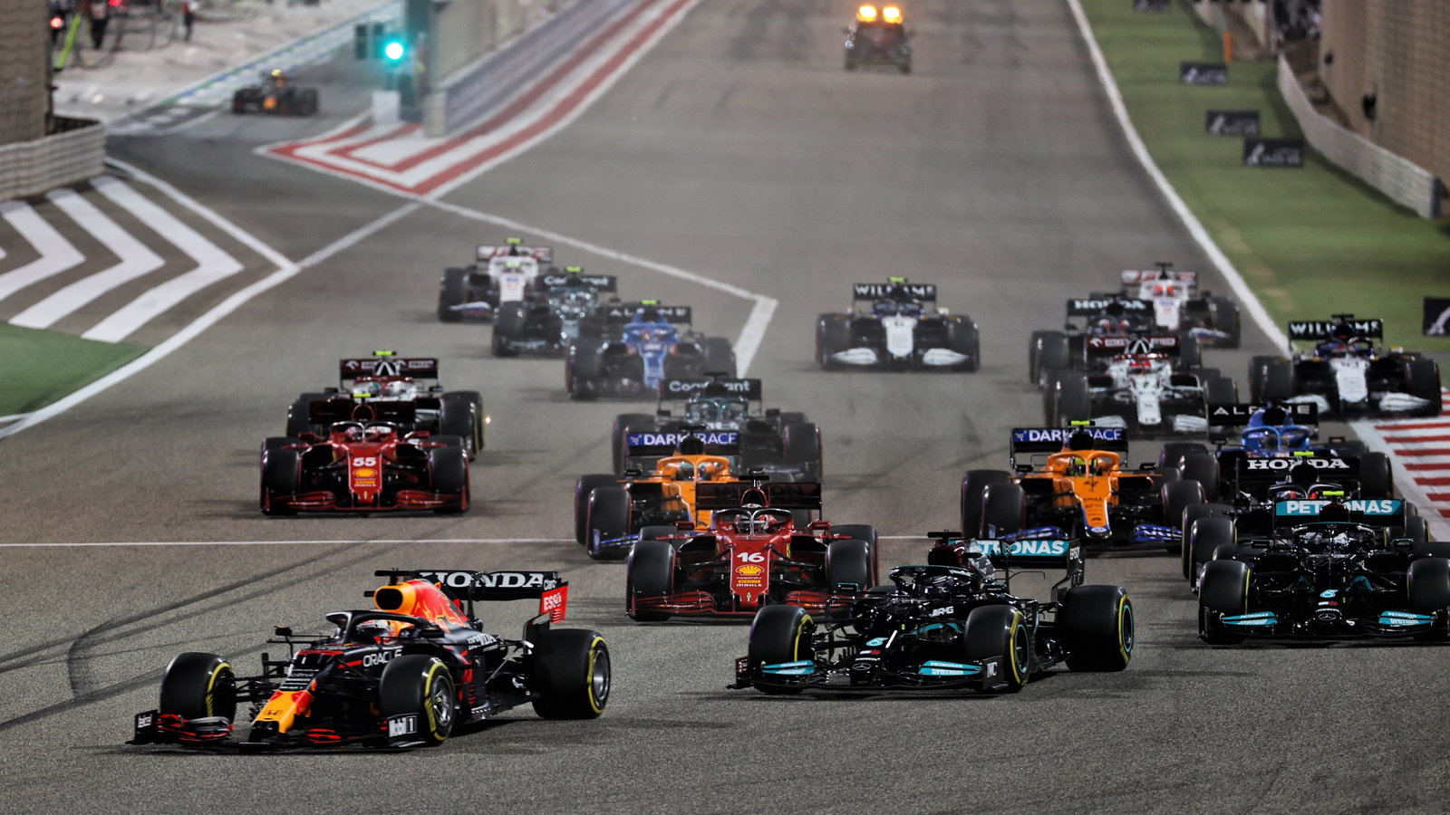 Max Verstappen (NLD) Red Bull Racing RB16B leads at the start of the race.