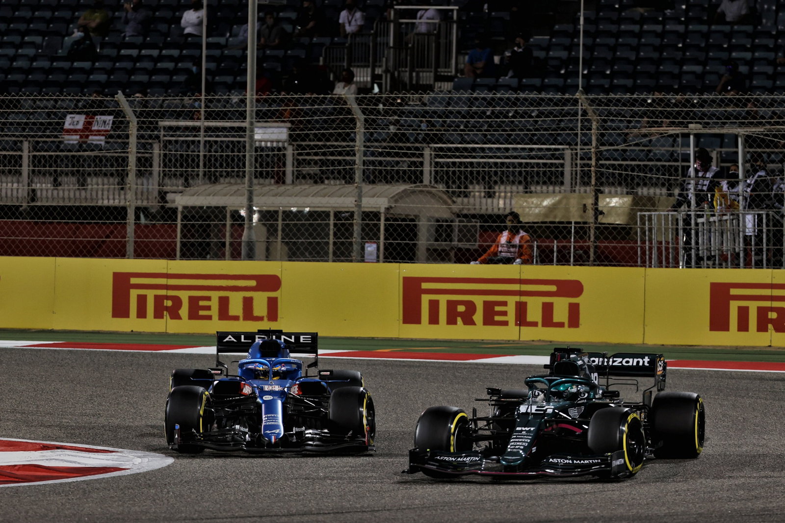 Fernando Alonso (ESP) Alpine F1 Team A521 and Lance Stroll (CDN) Aston Martin F1 Team AMR21.