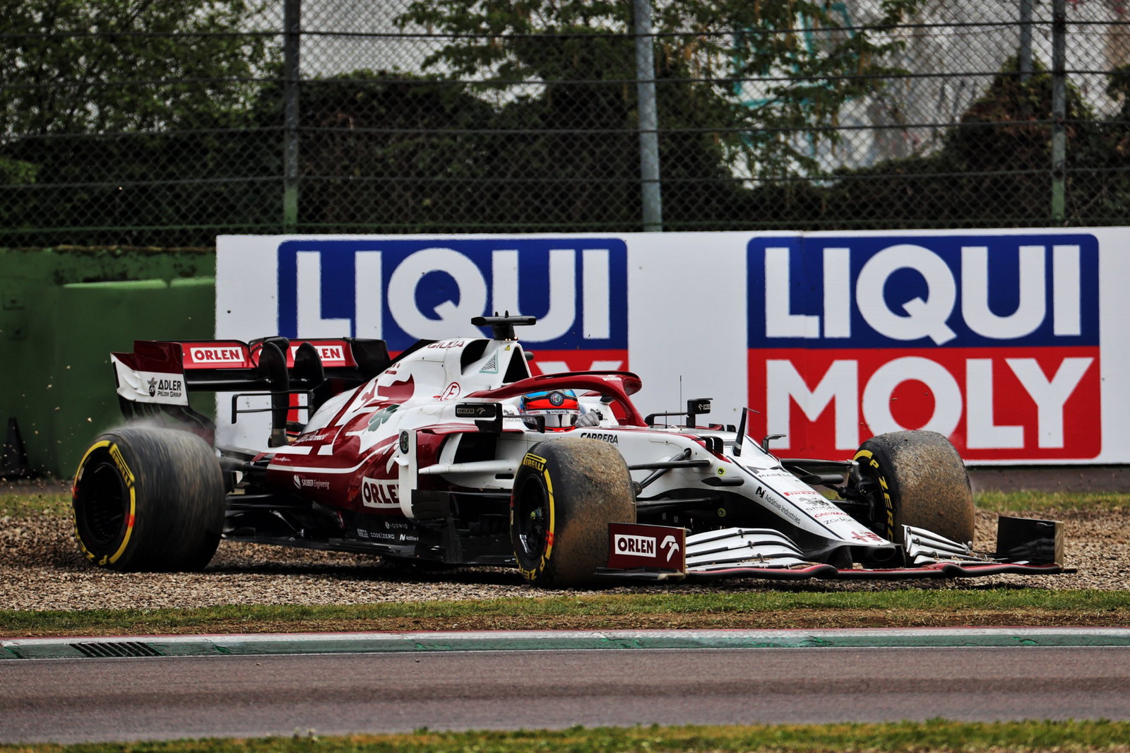 Kimi Raikkonen (FIN) Alfa Romeo Racing C41 rejoins the circuit.