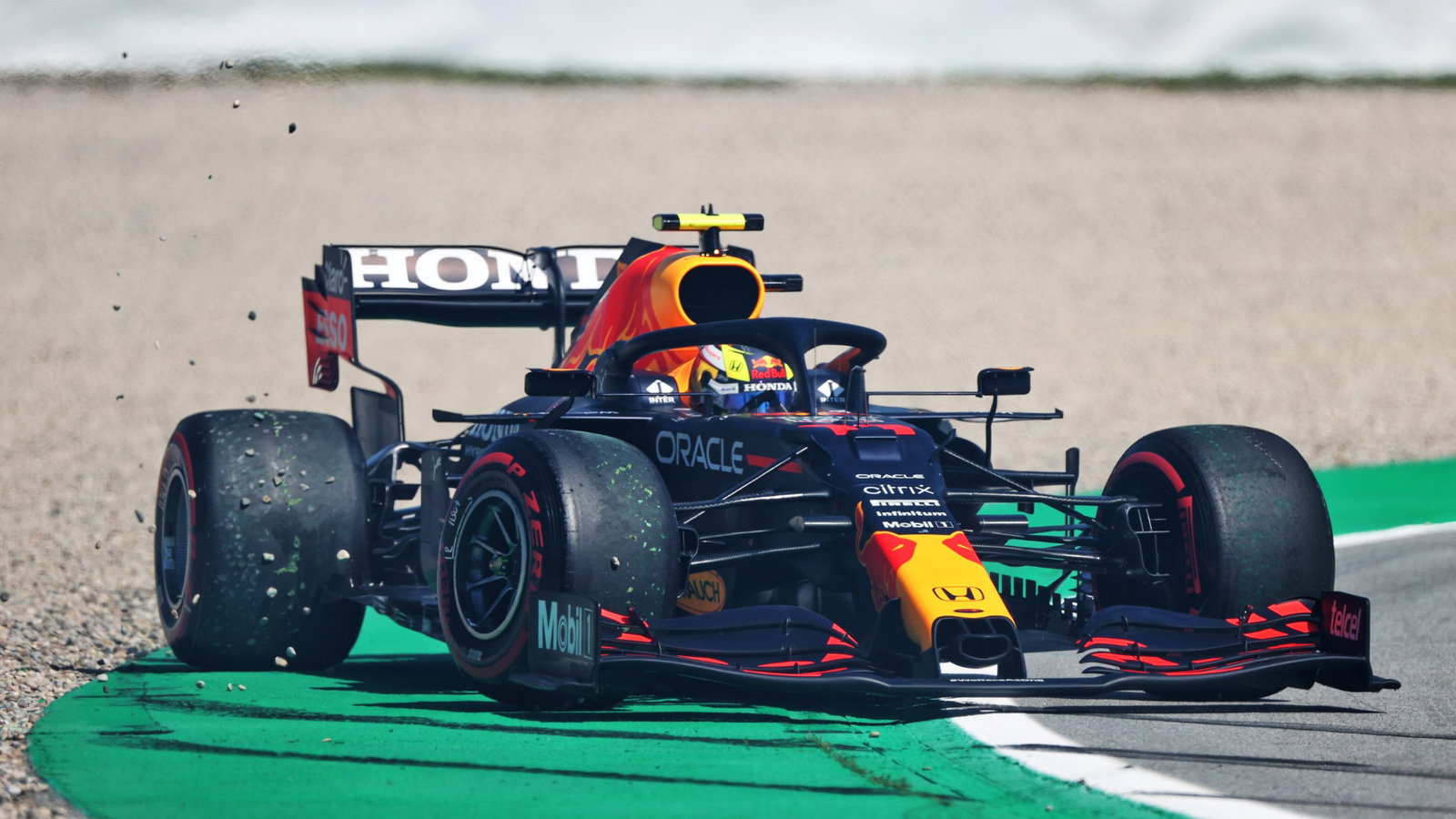 Sergio Perez (MEX) Red Bull Racing RB16B spins during qualifying.