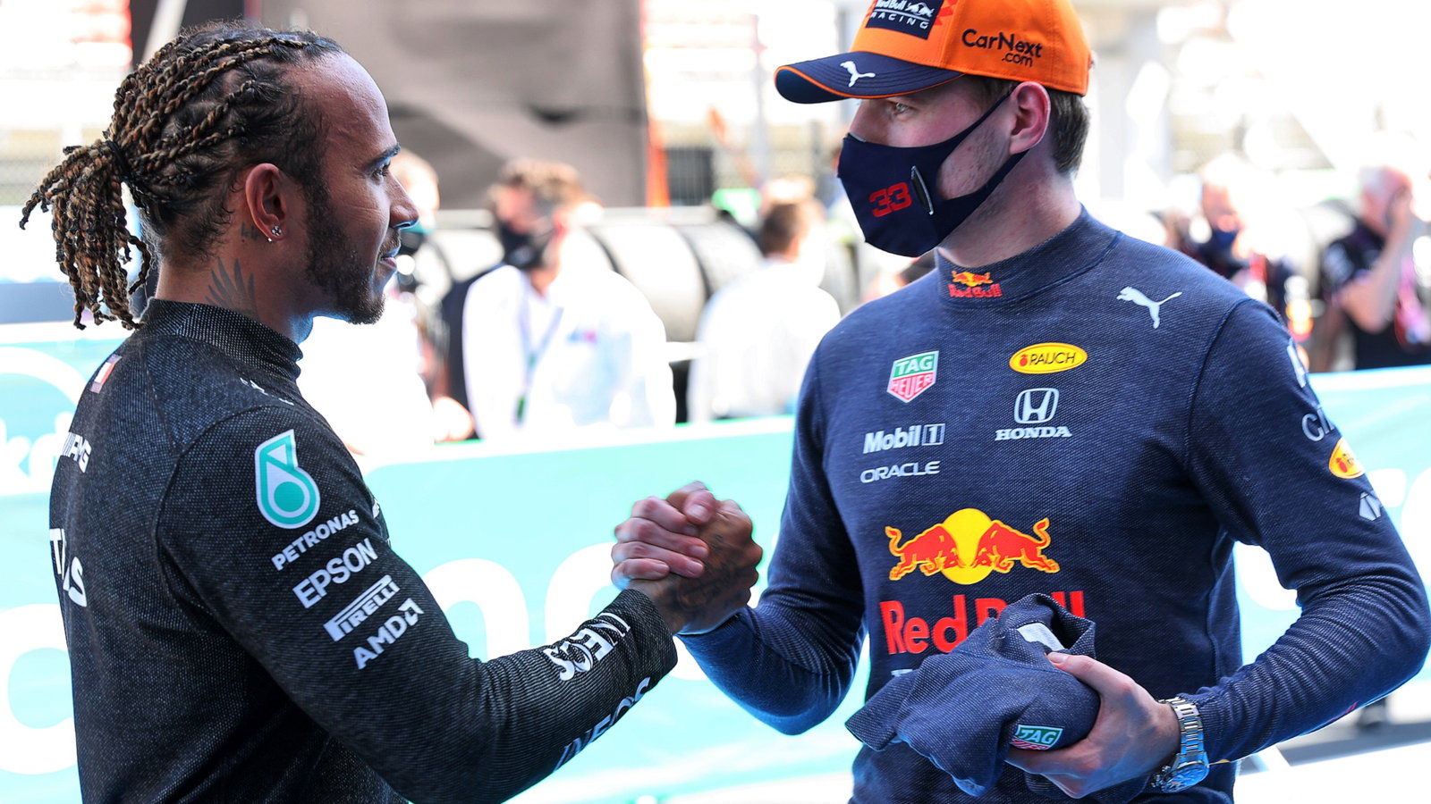 (L to R): Lewis Hamilton (GBR) Mercedes AMG F1 celebrates his 100th pole position in qualifying parc ferme with second placed Max Verstappen (NLD) Red Bull Racing.
