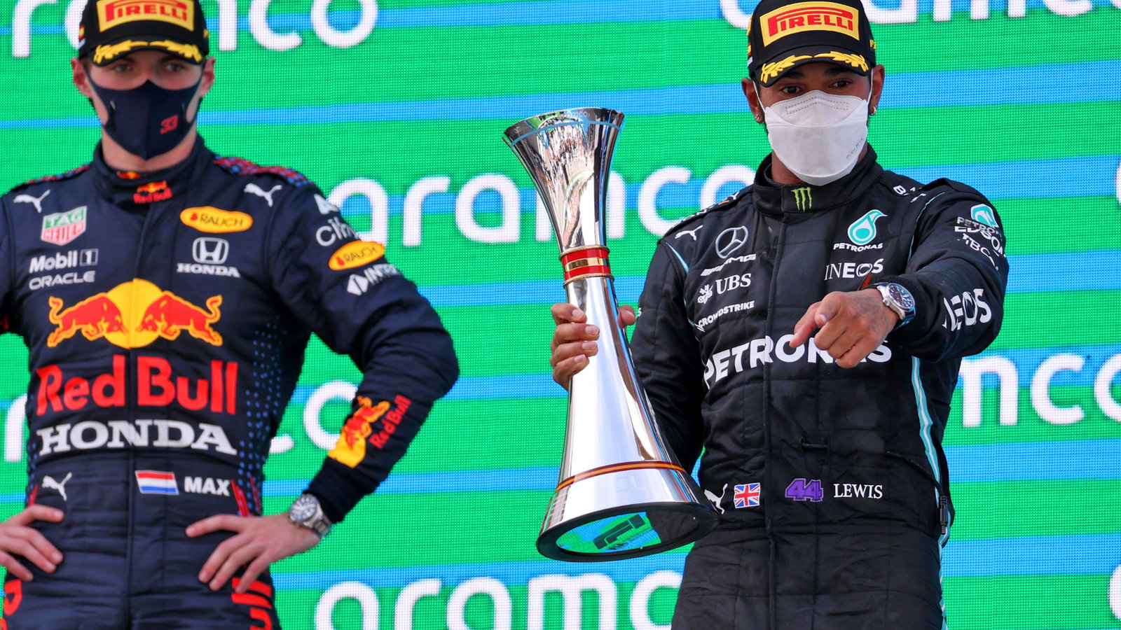 Race winner Lewis Hamilton (GBR) Mercedes AMG F1 celebrates on the podium with Max Verstappen (NLD) Red Bull Racing (Left).