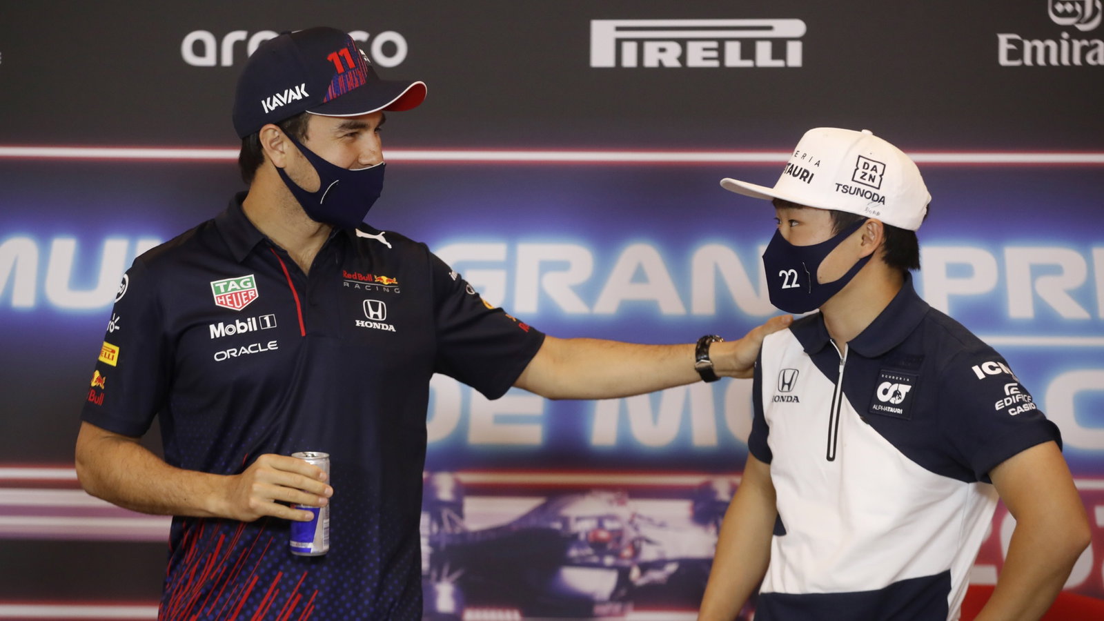 (L to R): Sergio Perez (MEX) Red Bull Racing and Yuki Tsunoda (JPN) AlphaTauri in the FIA Press Conference.