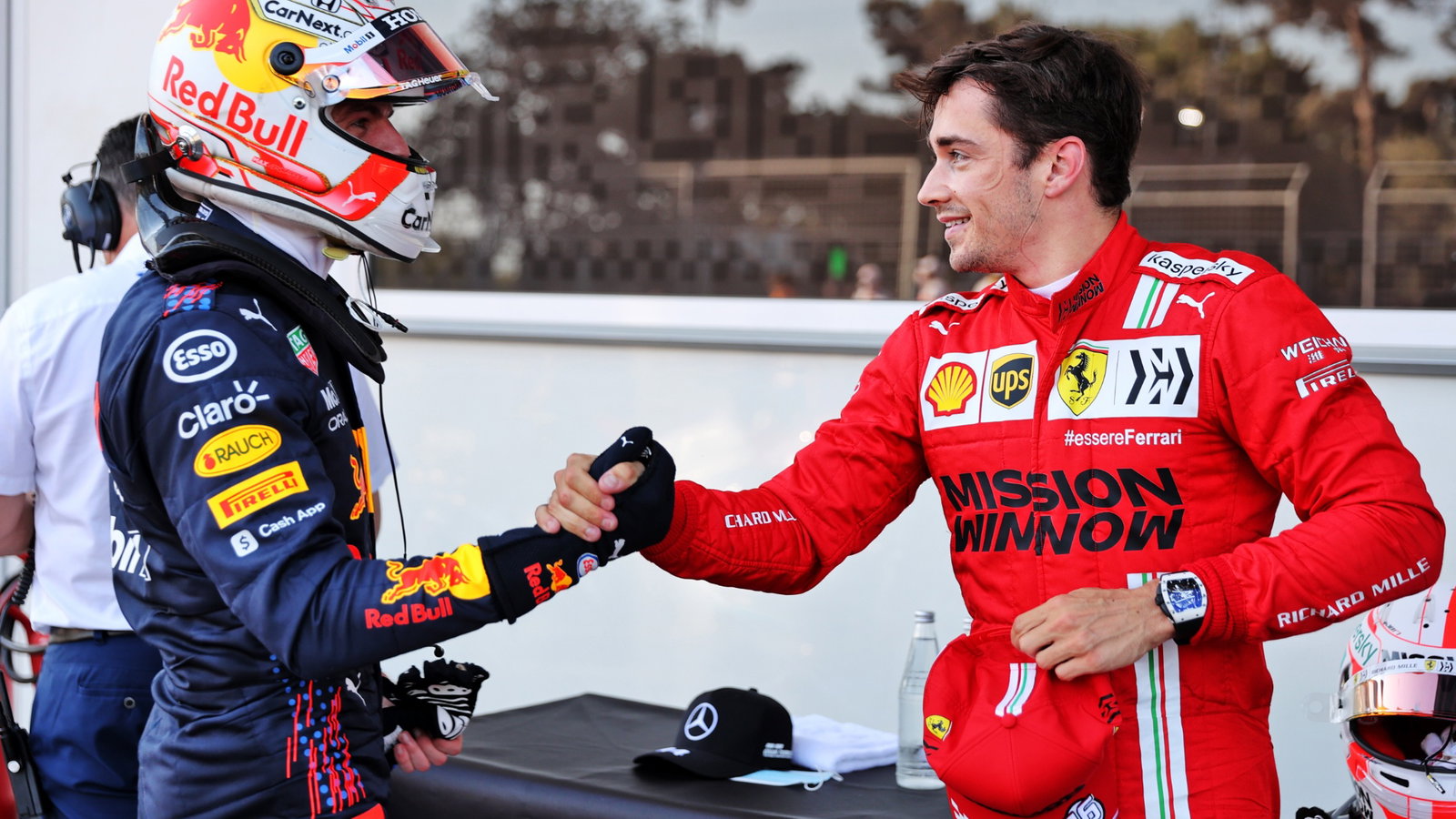 Charles Leclerc (MON) Ferrari (Right) celebrates his pole position in qualifying parc ferme with Max Verstappen (NLD) Red Bull Racing.