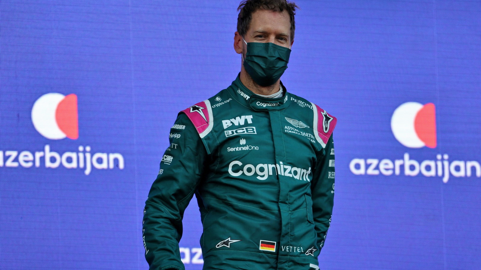 Sebastian Vettel (GER) Aston Martin F1 Team celebrates his second position on the podium.