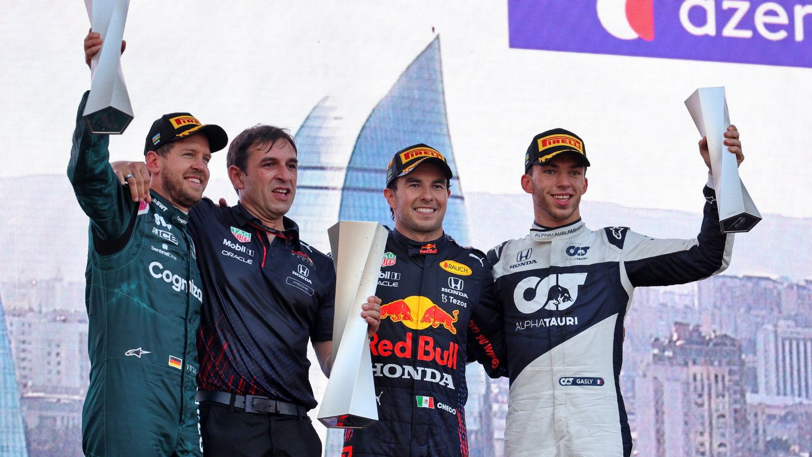 The podium (L to R): Sebastian Vettel (GER) Aston Martin F1 Team; second; Pierre Wache (FRA) Red Bull Racing Technical Director; Sergio Perez (MEX) Red Bull Racing, race winner; Pierre Gasly (FRA) AlphaTauri, third.