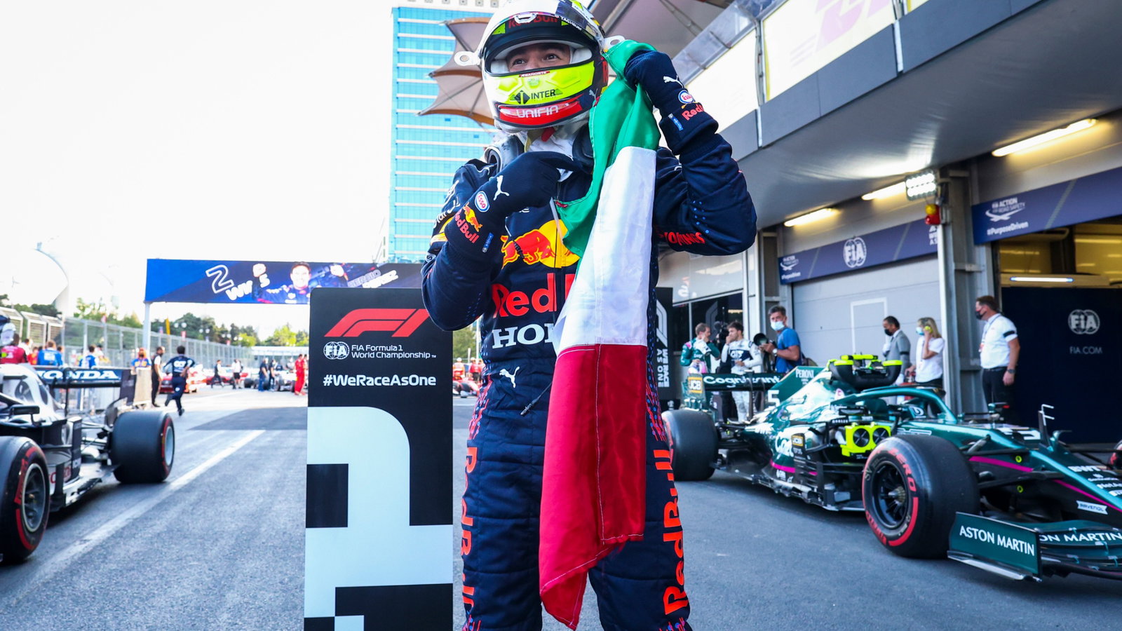 Race winner Sergio Perez (MEX) Red Bull Racing celebrates in parc ferme.