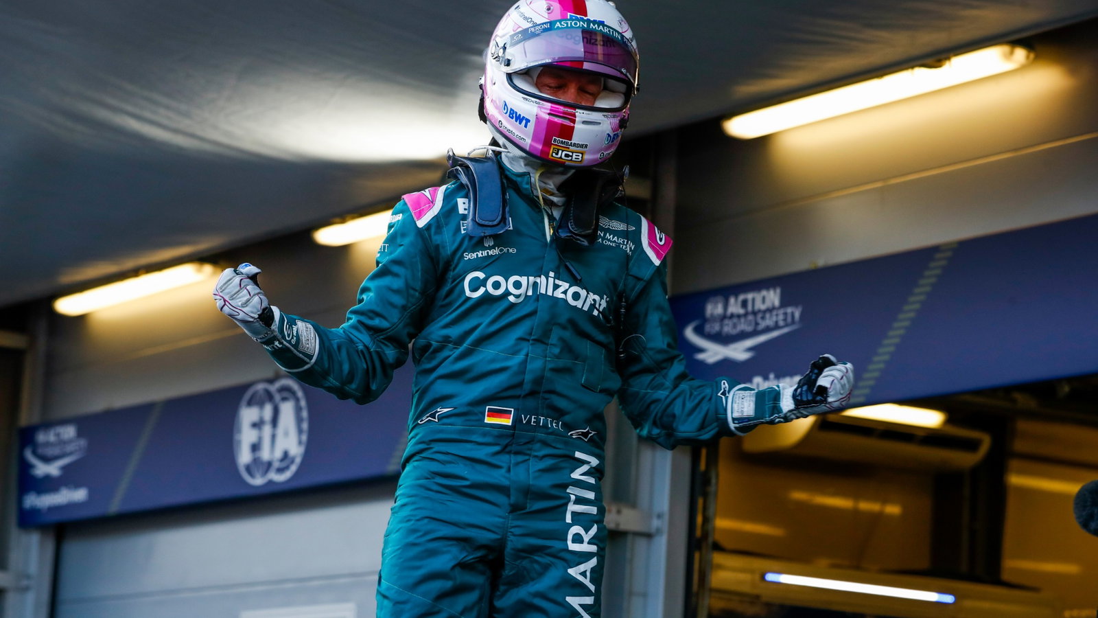 Sebastian Vettel (GER) Aston Martin F1 Team celebrates his second position in parc ferme.