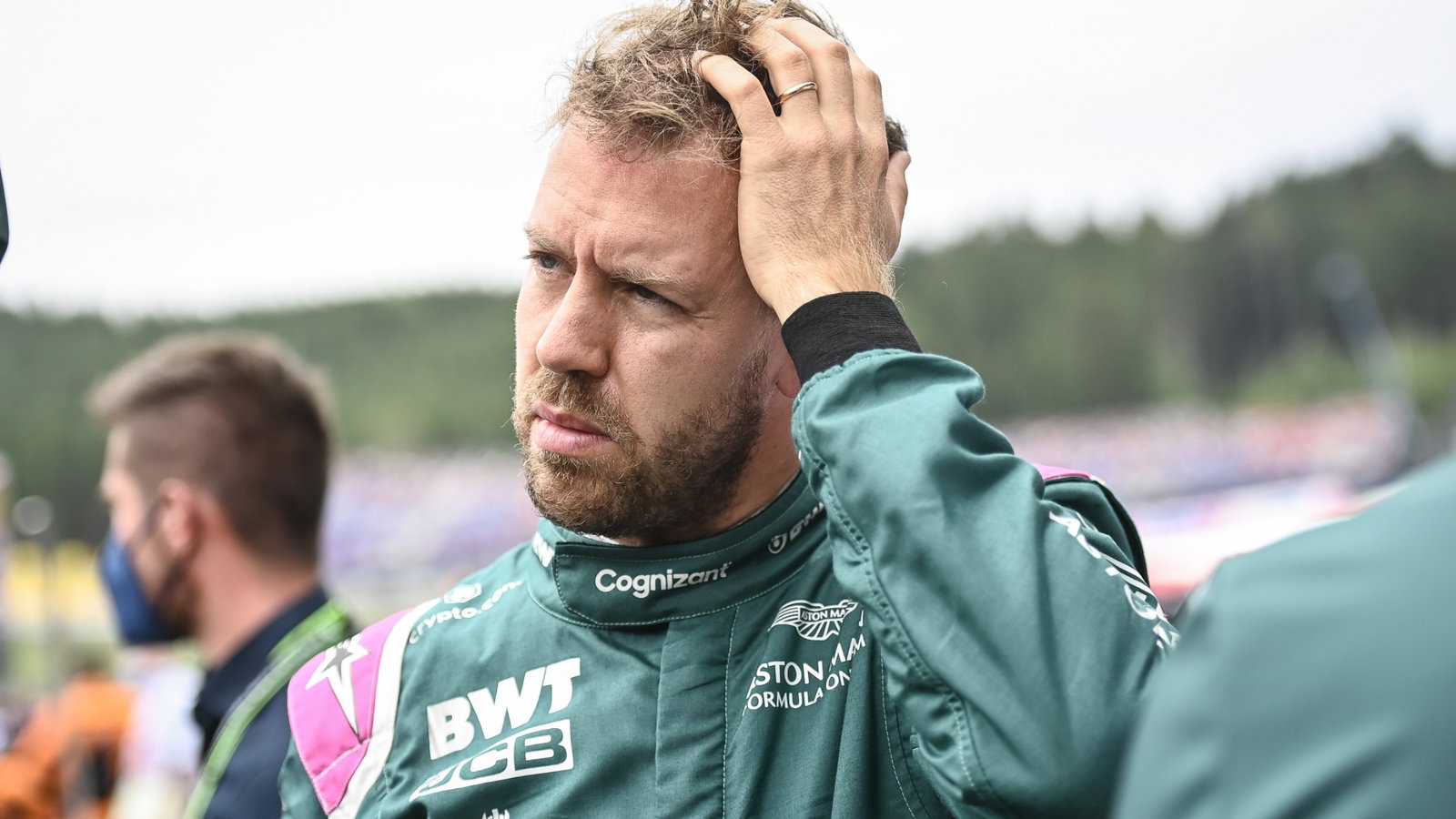 Sebastian Vettel (GER) Aston Martin F1 Team on the grid.
