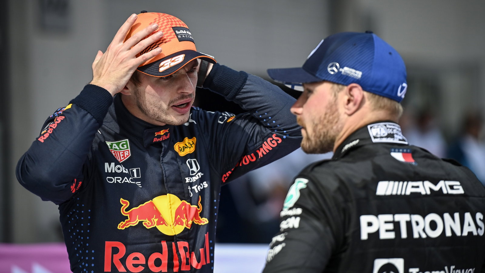 (L to R): Race winner Max Verstappen (NLD) Red Bull Racing with second placed Valtteri Bottas (FIN) Mercedes AMG F1 in parc ferme.