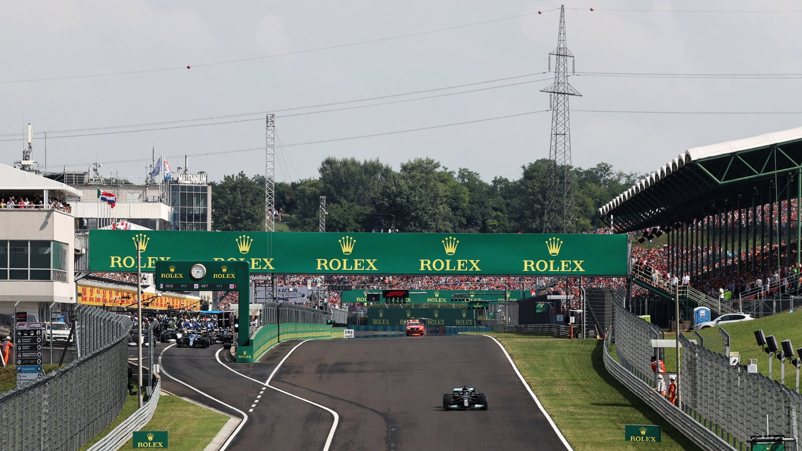 Lewis Hamilton (GBR) Mercedes AMG F1 W12 leads at the restart of the race as every other car pits. 