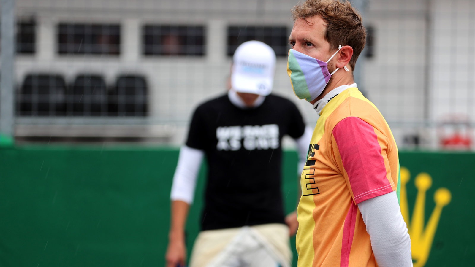 Sebastian Vettel (GER) Aston Martin F1 Team wearing a rainbow t-shirt on the grid.