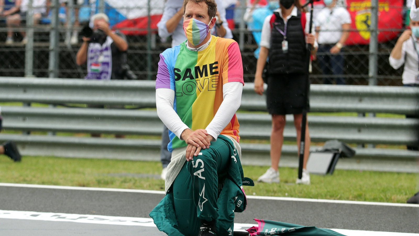 Sebastian Vettel (GER) Aston Martin F1 Team on the grid.