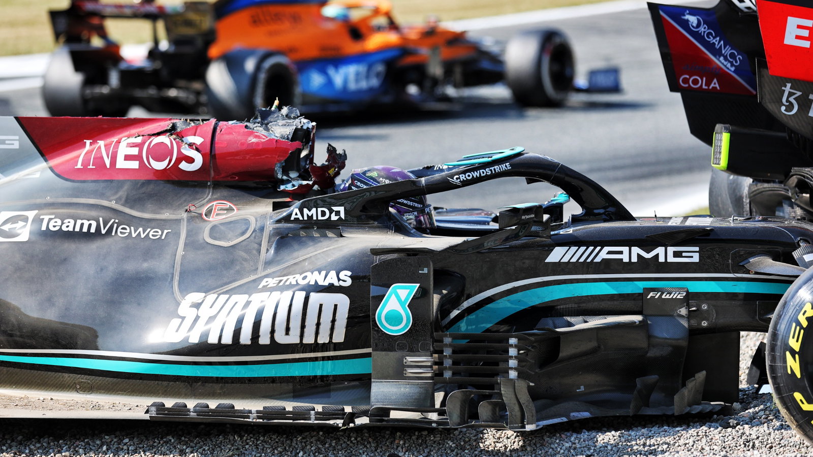 Lewis Hamilton (GBR) Mercedes AMG F1 W12 after he crashed with Max Verstappen (NLD) Red Bull Racing at the first chicane.