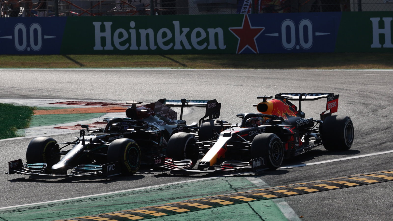 Max Verstappen (NLD) Red Bull Racing RB16B and Lewis Hamilton (GBR) Mercedes AMG F1 W12 crash at the first chicane.