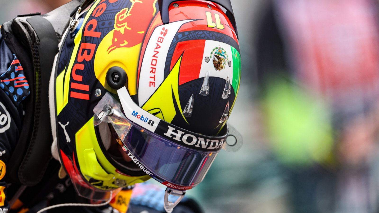 Sergio Perez (MEX) Red Bull Racing on the grid.