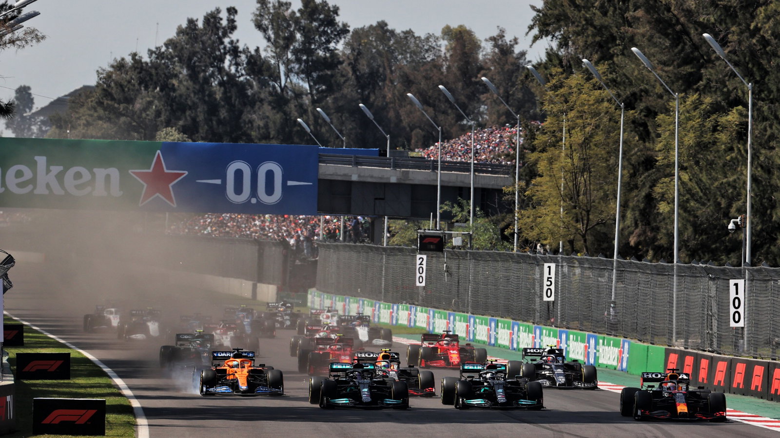 (L to R): Daniel Ricciardo (AUS) McLaren MCL35M; Lewis Hamilton (GBR) Mercedes AMG F1 W12; Valtteri Bottas (FIN) Mercedes AMG F1 W12; and Max Verstappen (NLD) Red Bull Racing RB16B at the start of the race.