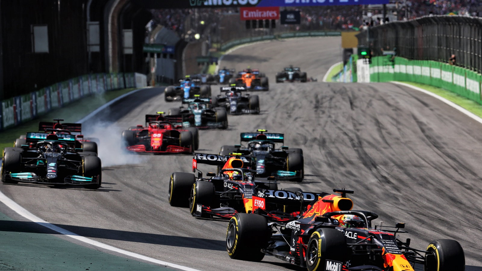 Max Verstappen (NLD) Red Bull Racing RB16B leads at the Safety Car restart.