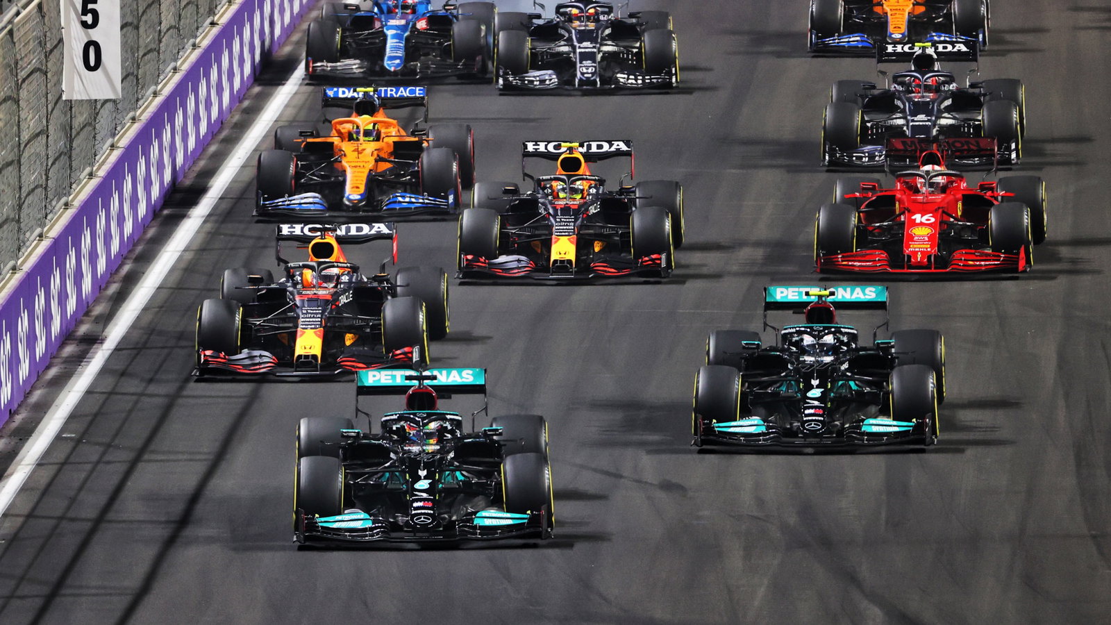 Lewis Hamilton (GBR) Mercedes AMG F1 W12 leads at the start of the race.