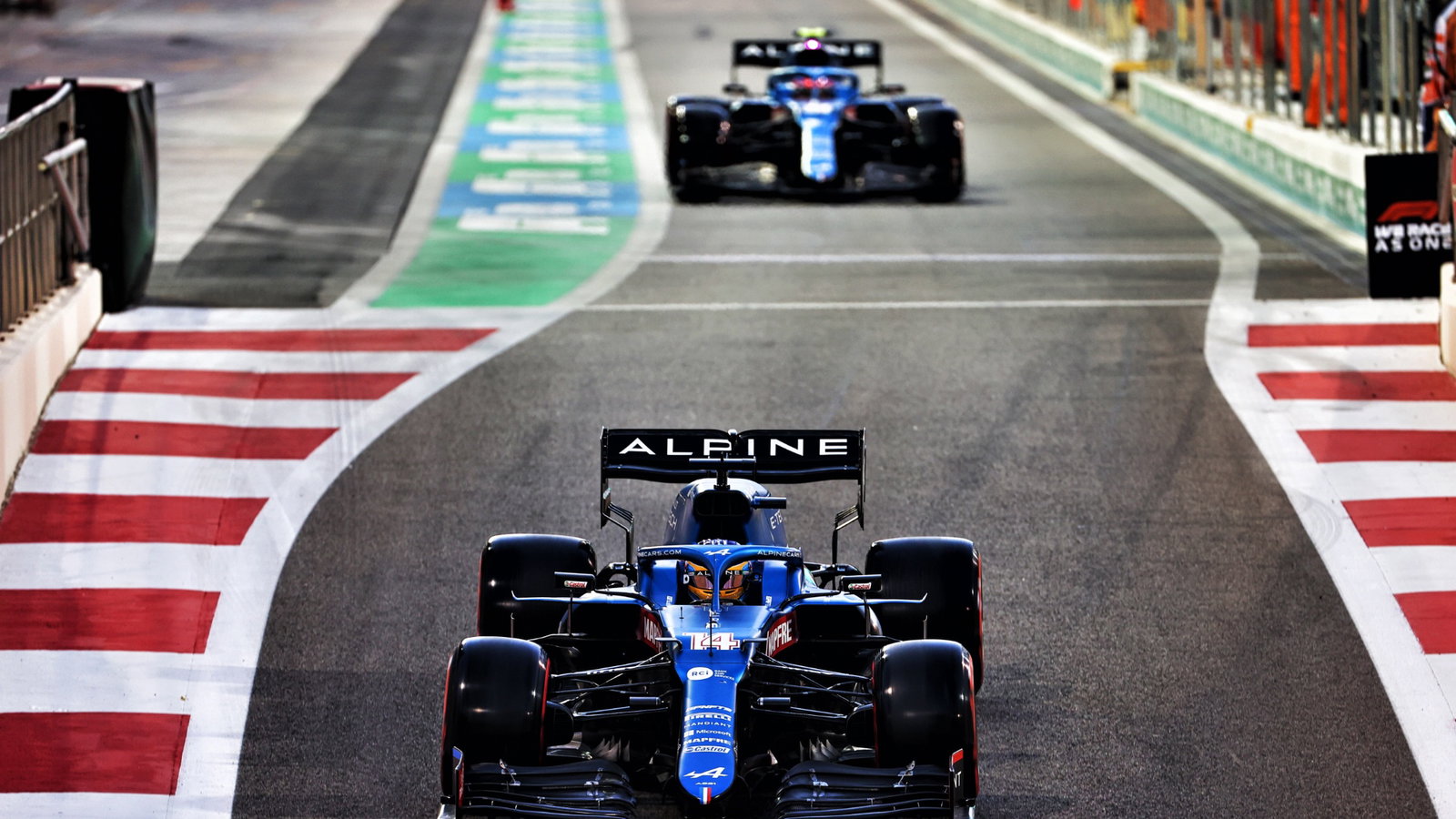 Fernando Alonso (ESP) Alpine F1 Team A521 leads team mate Esteban Ocon (FRA) Alpine F1 Team A521 out of the pits.