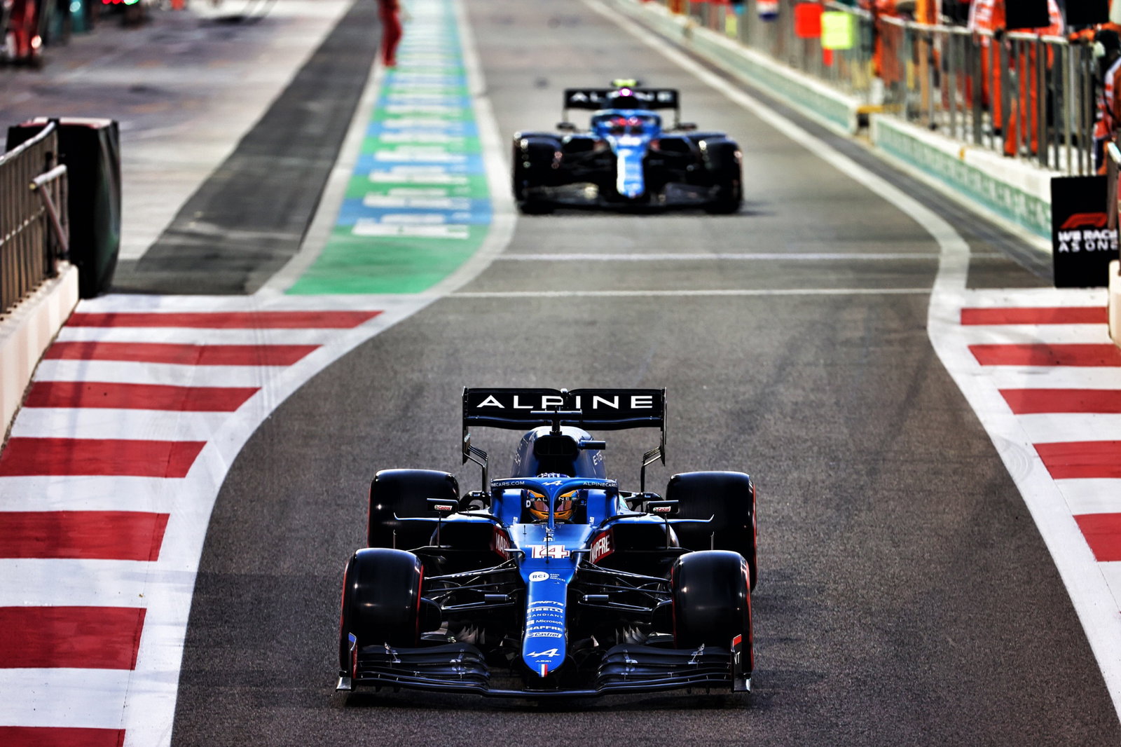 Fernando Alonso (ESP) Alpine F1 Team A521 leads team mate Esteban Ocon (FRA) Alpine F1 Team A521 out of the pits.