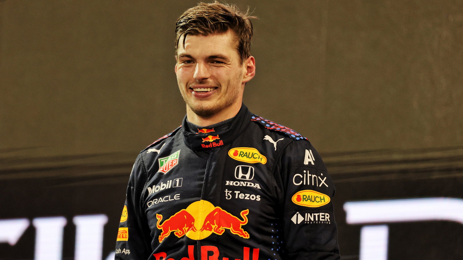 Race winner and World Champion Max Verstappen (NLD) Red Bull Racing celebrates on the podium.