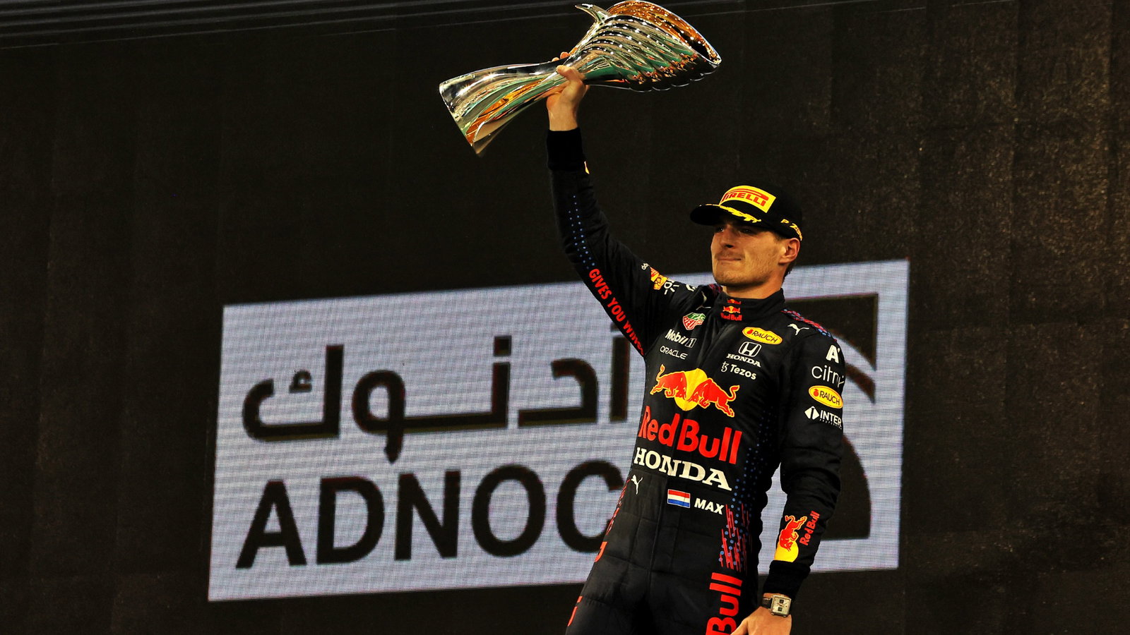 Race winner and World Champion Max Verstappen (NLD) Red Bull Racing celebrates on the podium.