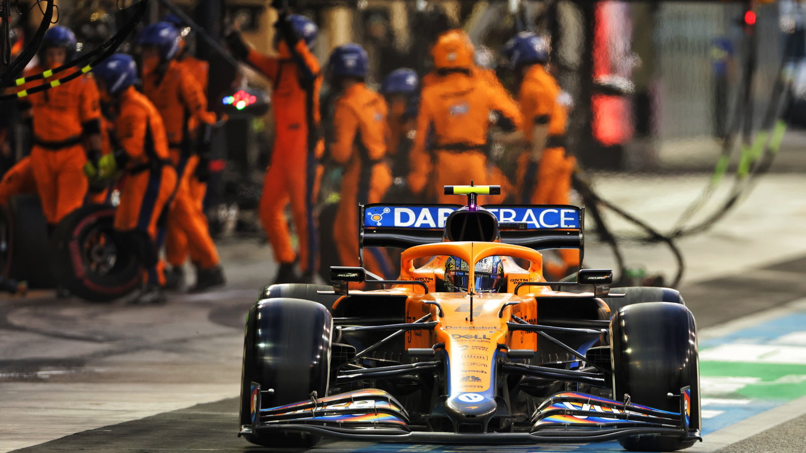 Lando Norris (GBR) McLaren MCL35M makes a pit stop.