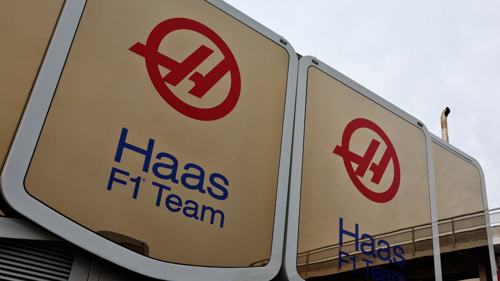 Haas F1 Team building in the paddock with Uralkali branding removed.