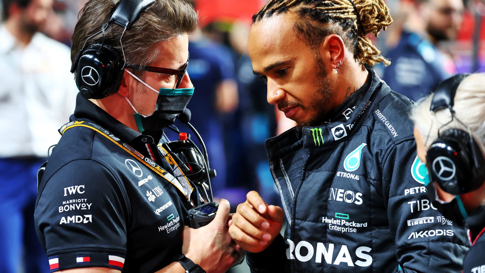 Mercedes AMG F1 Race Engineer with Lewis Hamilton (GBR) Mercedes AMG F1 on the grid.