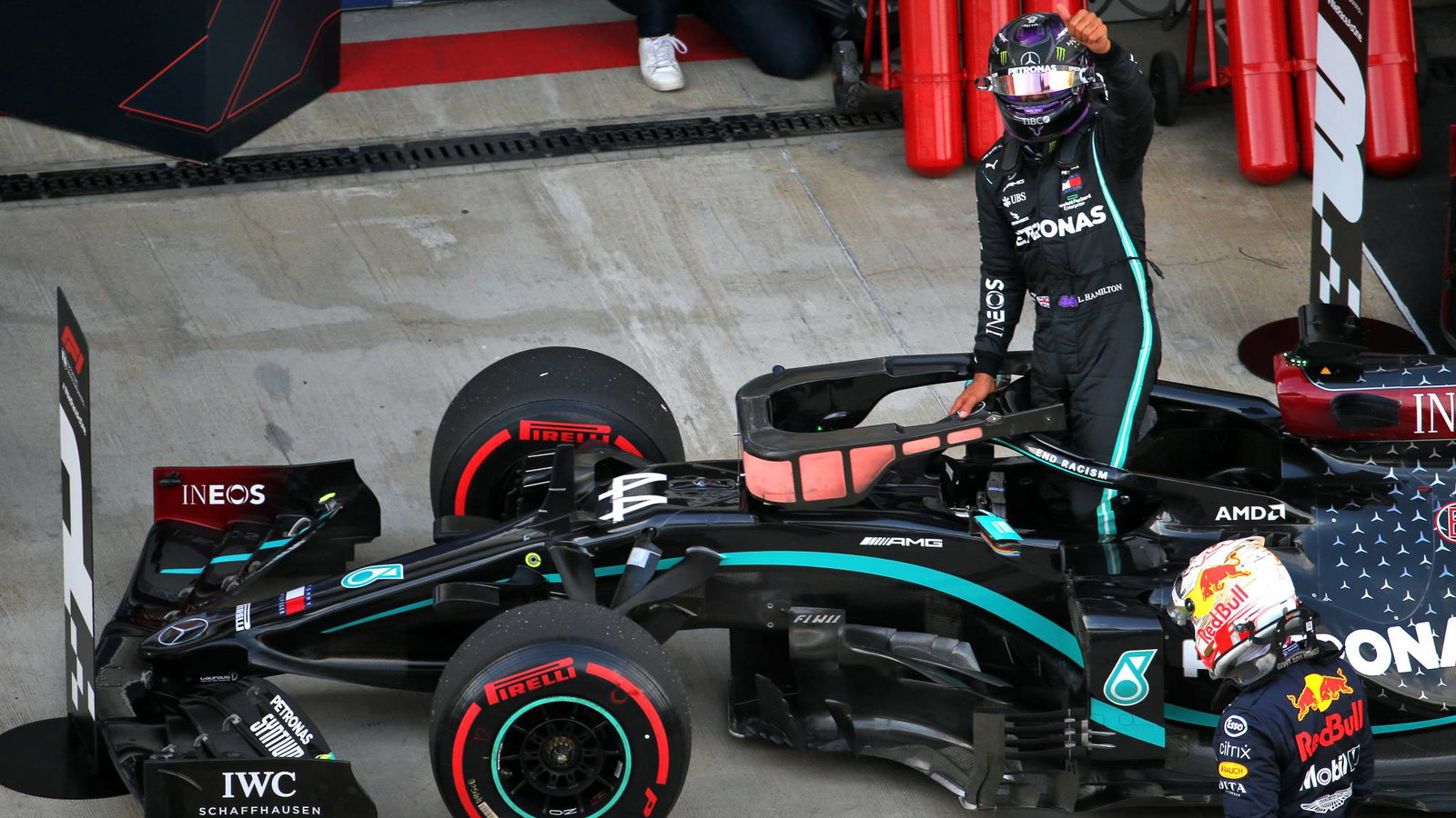 Lewis Hamilton (GBR) Mercedes AMG F1 W11 celebrates his pole position in qualifying parc ferme.
