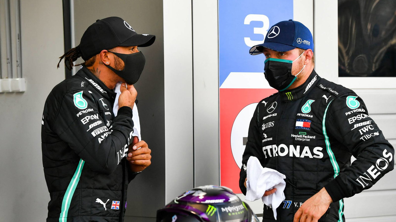 (L to R): Lewis Hamilton (GBR) Mercedes AMG F1 in qualifying parc ferme with team mate Valtteri Bottas (FIN) Mercedes AMG F1.