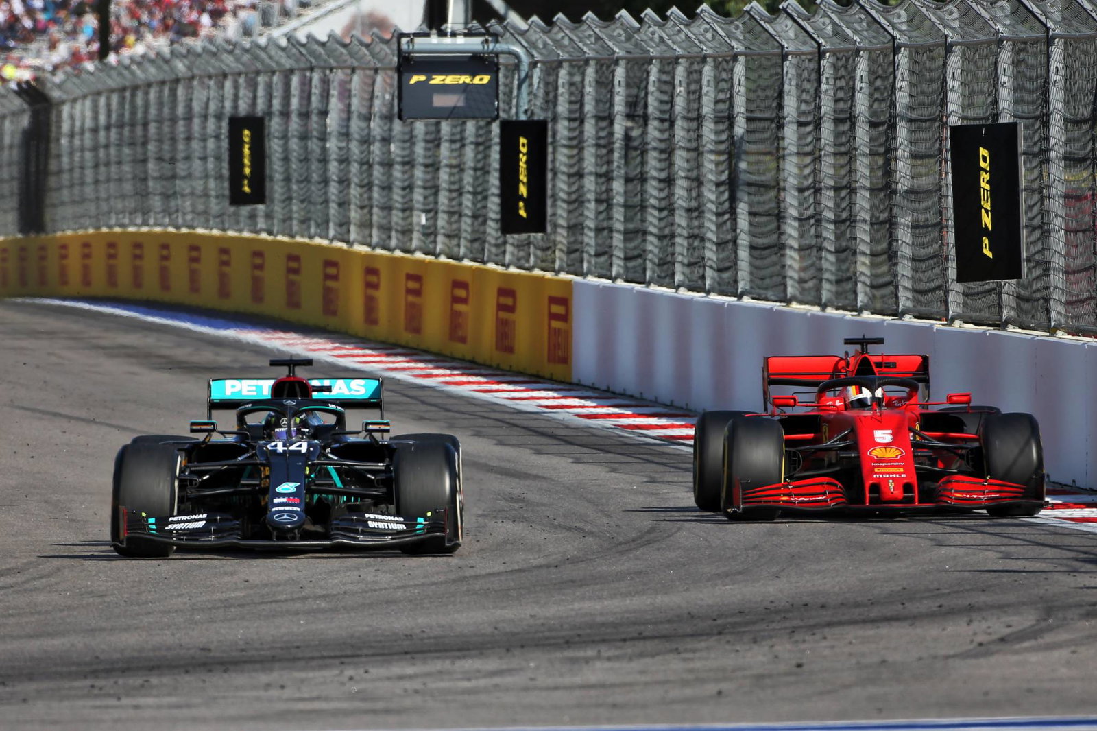 Lewis Hamilton (GBR) Mercedes AMG F1 W11 and Sebastian Vettel (GER) Ferrari SF1000.