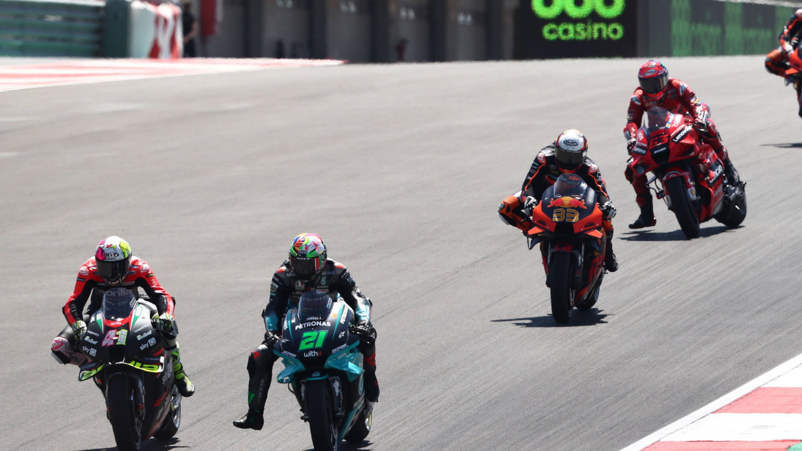 Aleix Espargaro Franco Morbidelli , Francesco Bagnaia sidways under braking, MotoGP race, Portuguese MotoGP. 18 April 2021