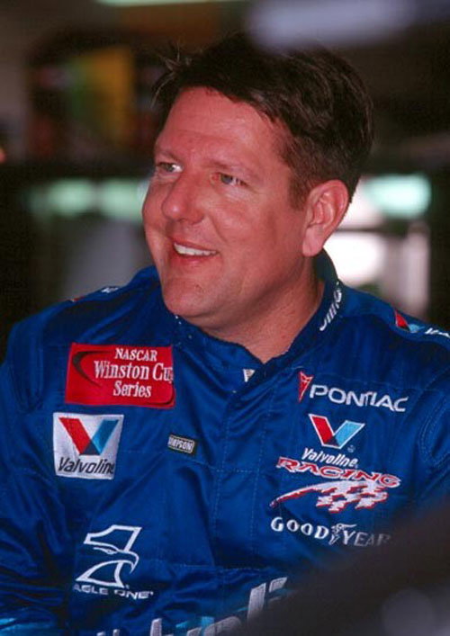 Stewart survives Earnhardt onslaught.