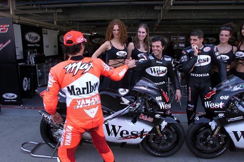 Ueda wins rain interrupted 125 race.