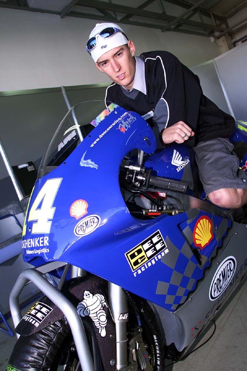 Ueda wins rain interrupted 125 race.