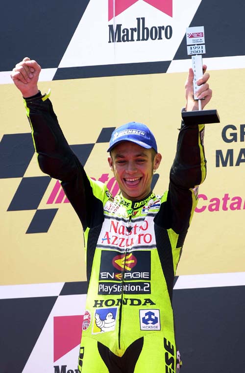 Capirossi edges out Rossi for provisional pole.