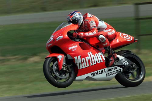 Biaggi wins as rain stops play at Assen.