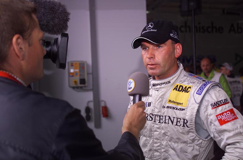 Champion Aiello on the podium.