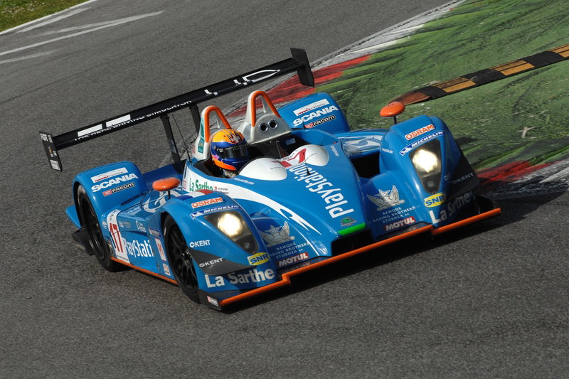 Peugeot takes controversial win.