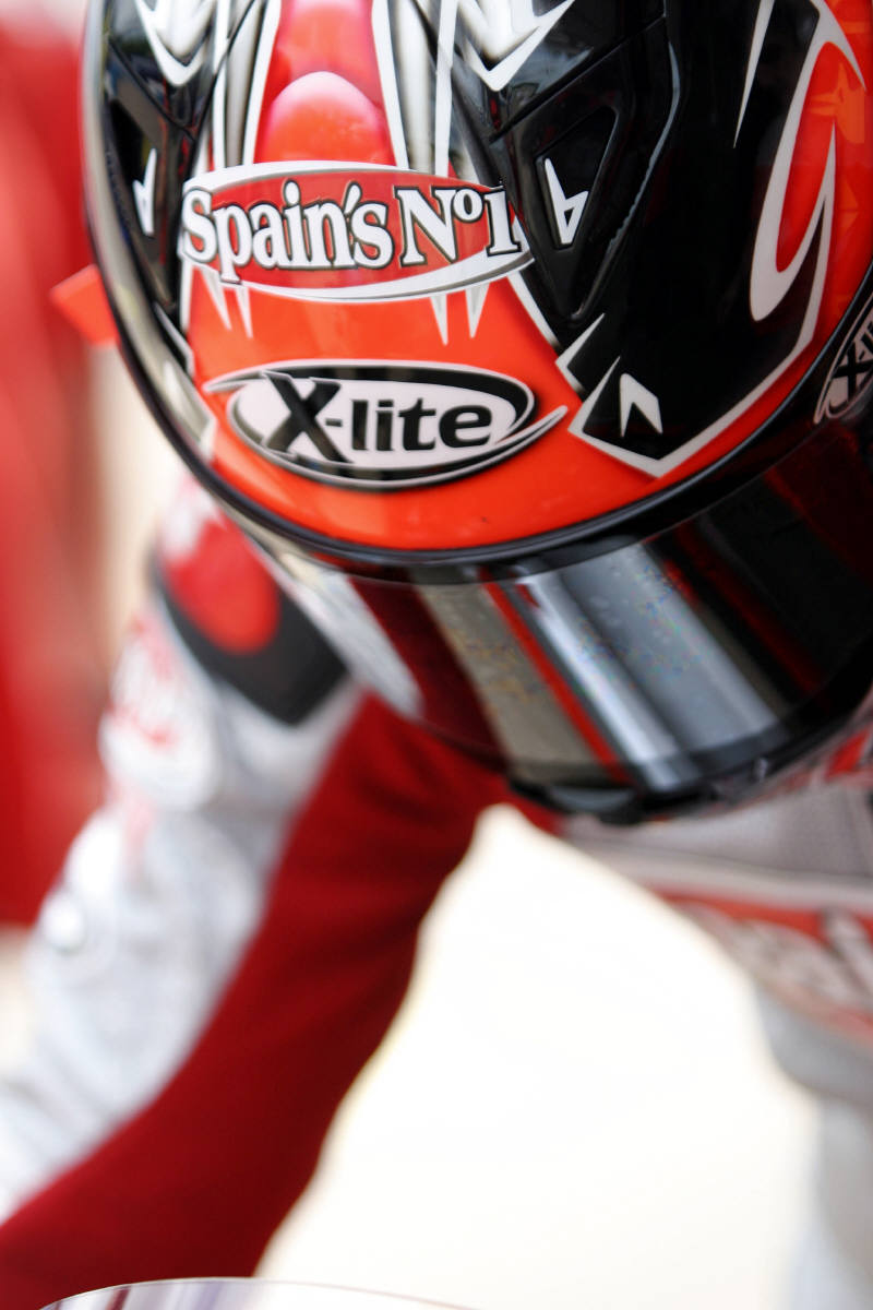 Rossi leads warm-up, Capirossi has fiery accident.