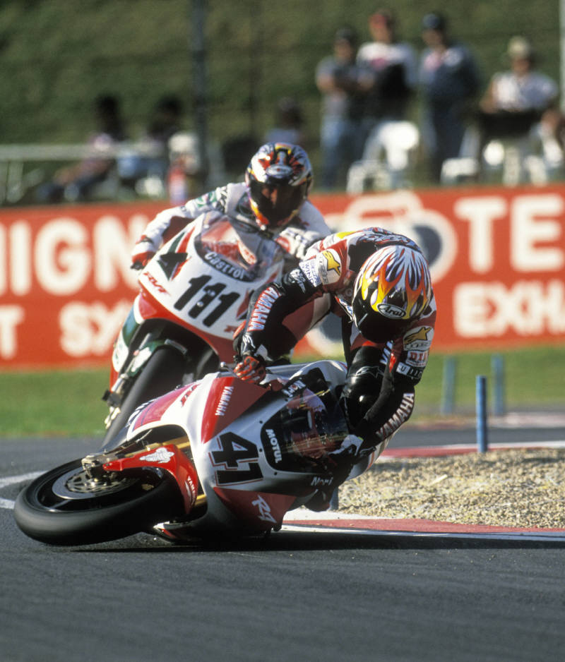 Alice rides pillion with Ducati in 2004.