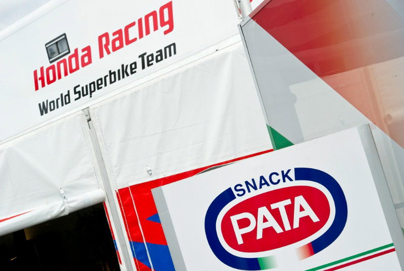 Red flag halts race one, Melandri already out