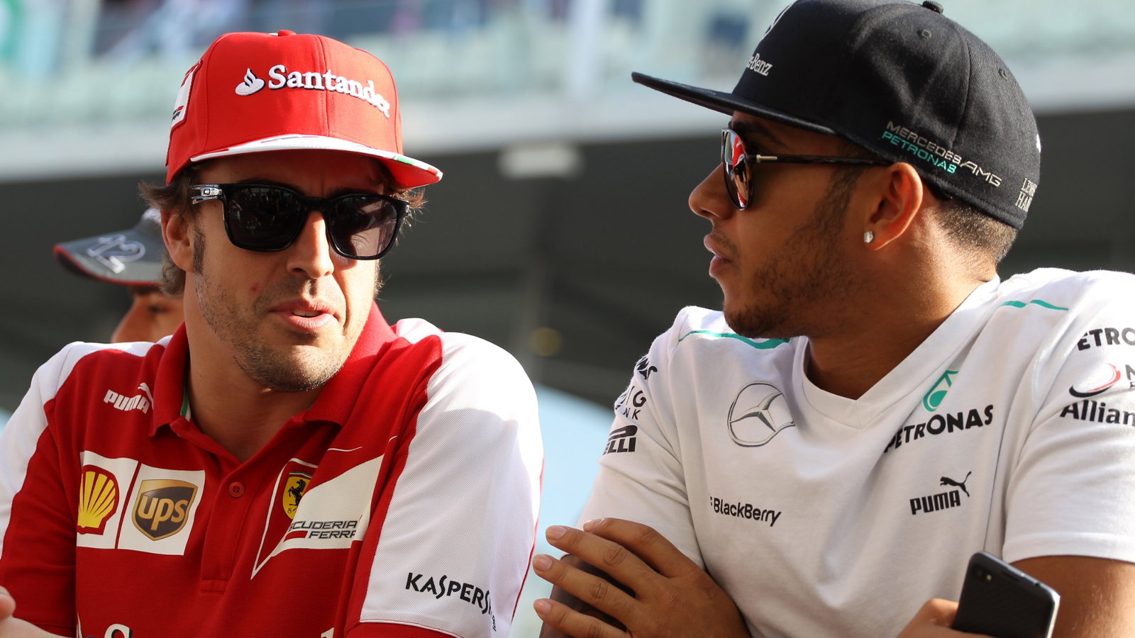 - Fernando Alonso (ESP) Scuderia Ferrari F138 and Lewis Hamilton (GBR) Mercedes AMG F1